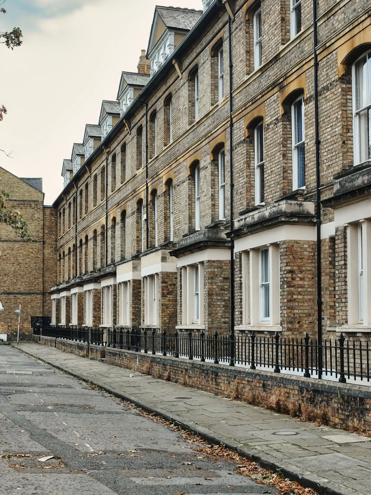 Victorian brick terraced houses on a residential street in Oxford