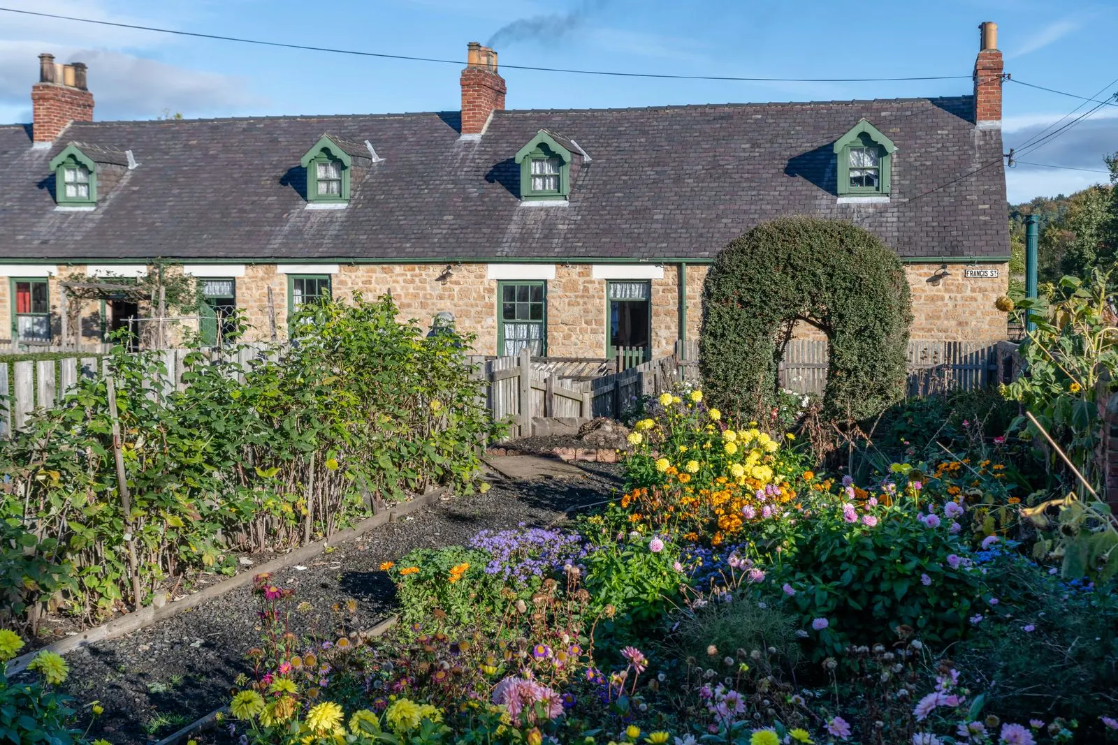 British terraced cottage with a front flower garden