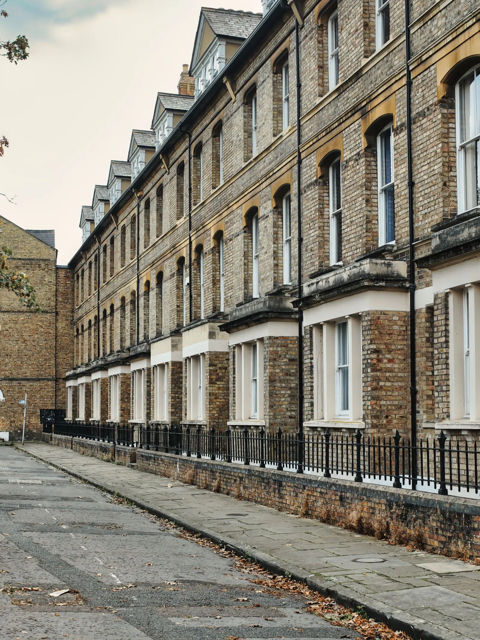 Victorian brick terraced houses on a residential street in Oxford